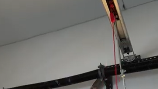 interior of a garage door with emergency opener