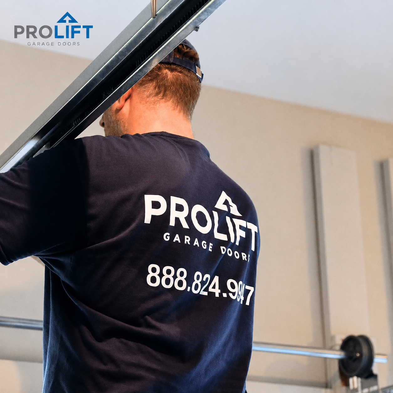 man working on garage door