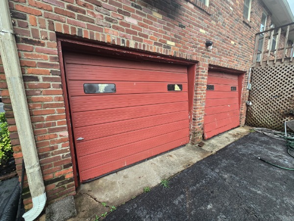 Older red garage doors – Nashville, TN